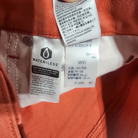 Levi's mid length shorts orange Waist 31'' length 13'' - Picture 4 of 6